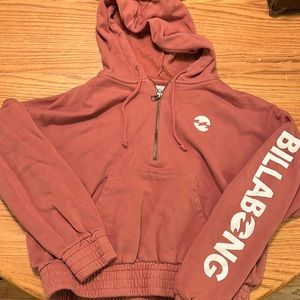 Slightly worn cropped rust colored hoodie